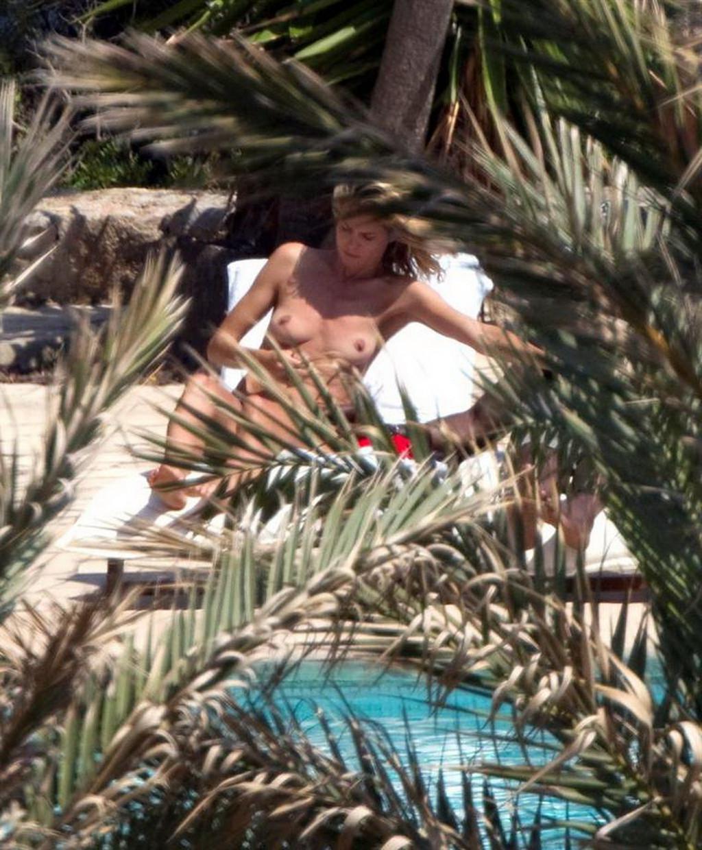 16P Heidi Klum caught sunbathing topless on vacation in Ibiza