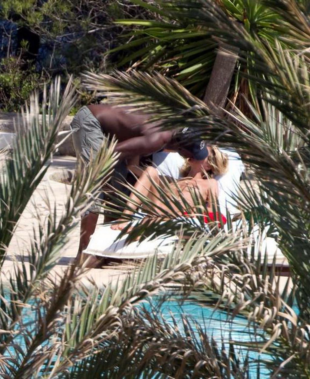 16P Heidi Klum caught sunbathing topless on vacation in Ibiza