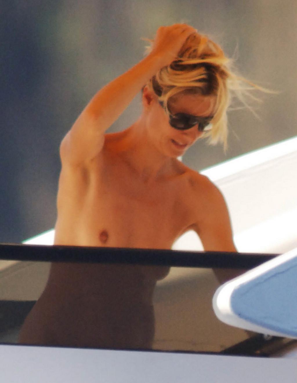 16P Heidi Klum caught sunbathing topless on vacation in Ibiza