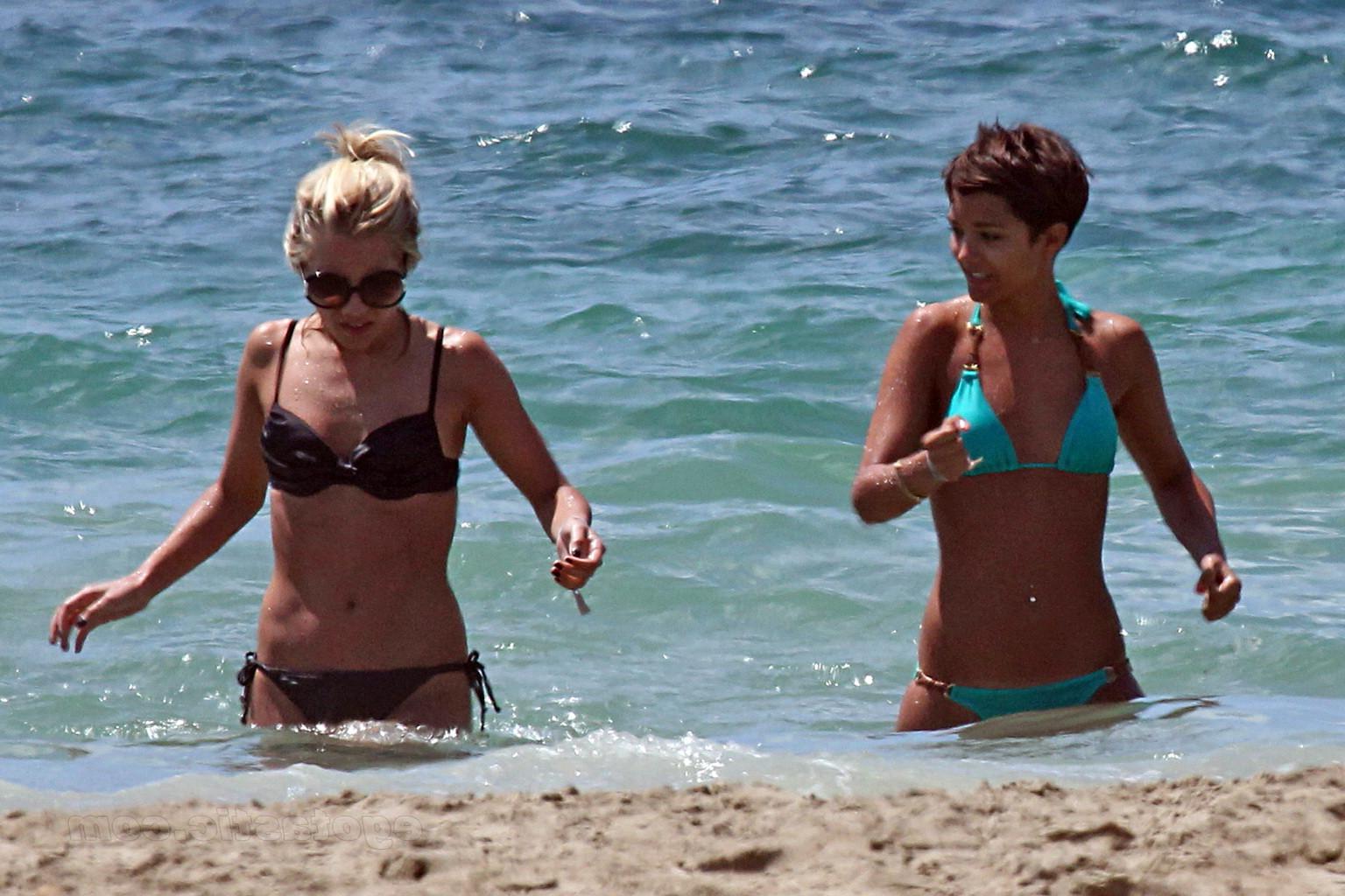 15P Frankie Sandford sunbathing topless on the beach in Ibiza