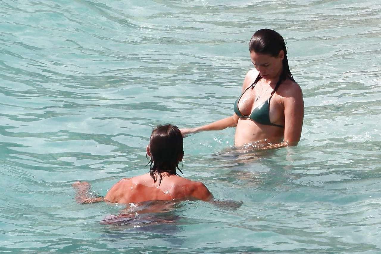 16P Ines Sastre nipple slip on beach caught by paparazzi and posing in bikini