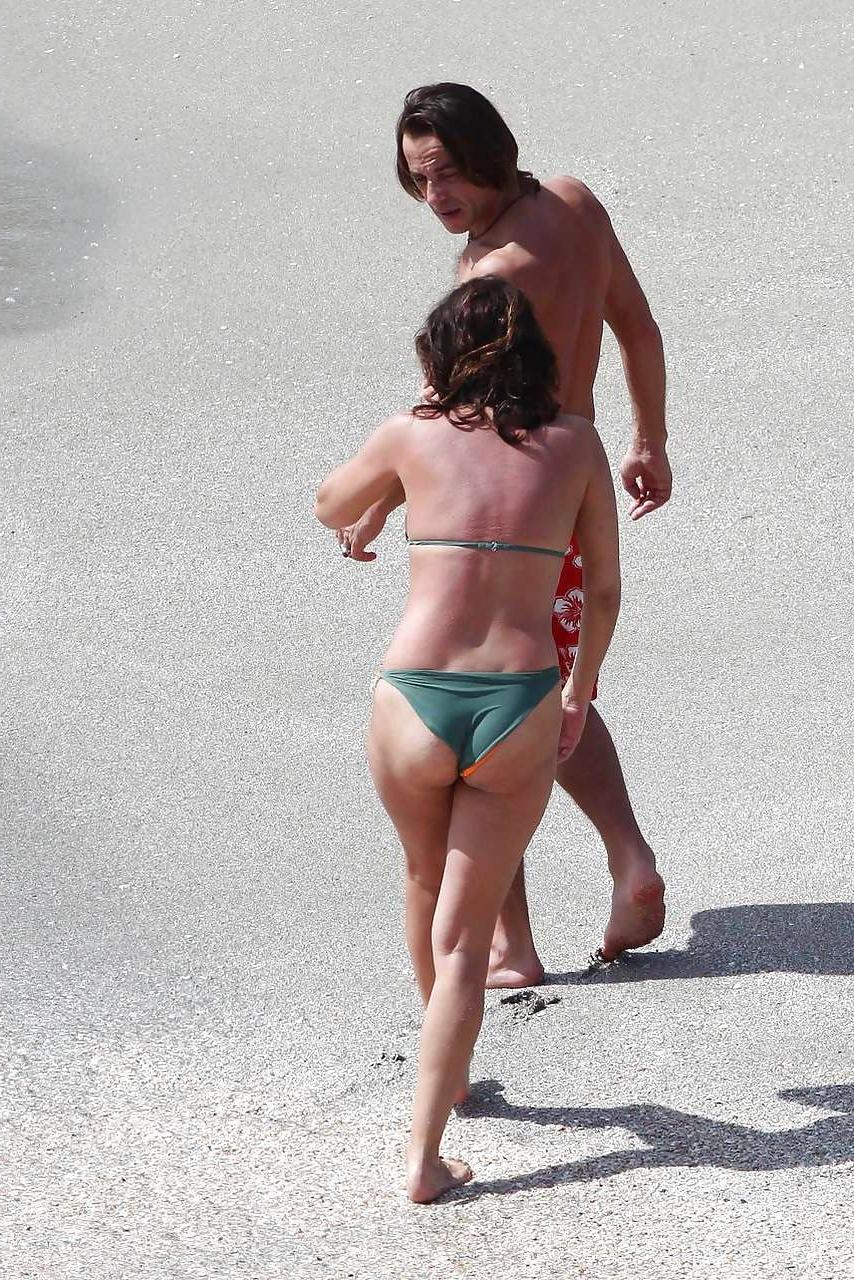 16P Ines Sastre nipple slip on beach caught by paparazzi and posing in bikini