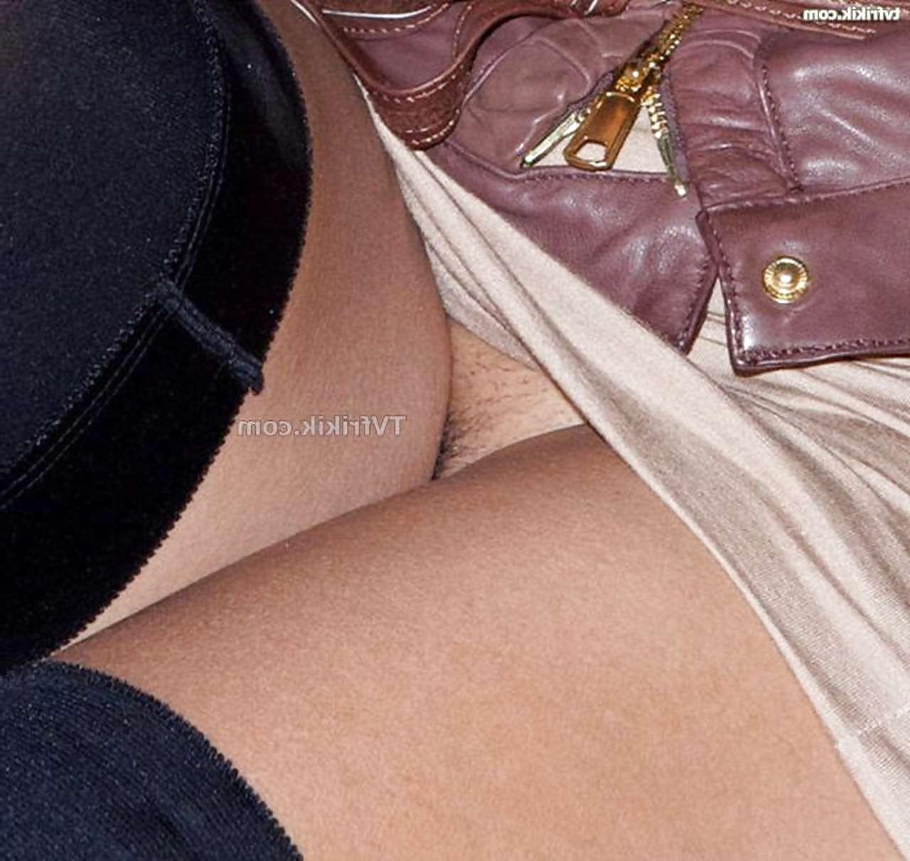16P Indira Weiss showing her hairy pussy upskirt in mini skirt caught by paparazzi
