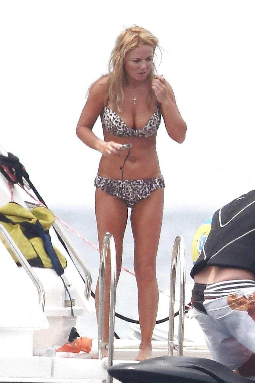 16P Geri Halliwell caught topless on yacht while changing her bikini top paparazzi p