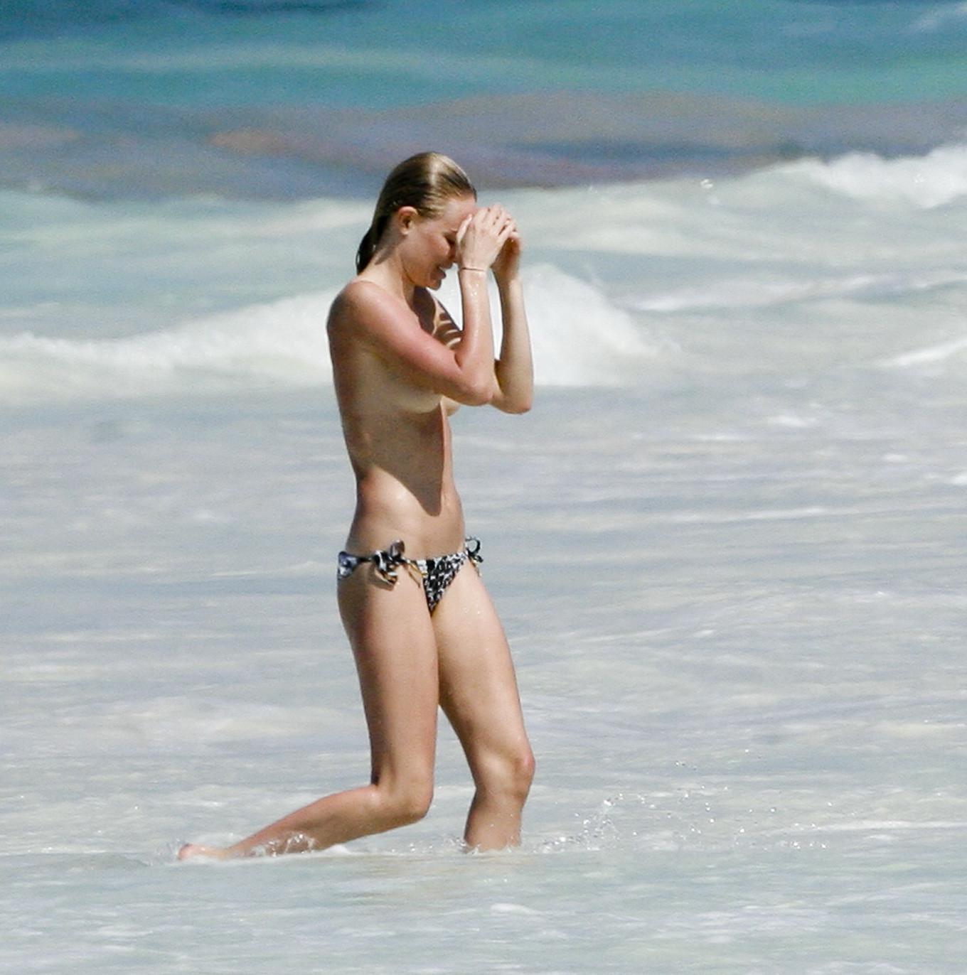 16P Kate Bosworth topless on the beach in Mexico but stupid paparazzi caught almost 