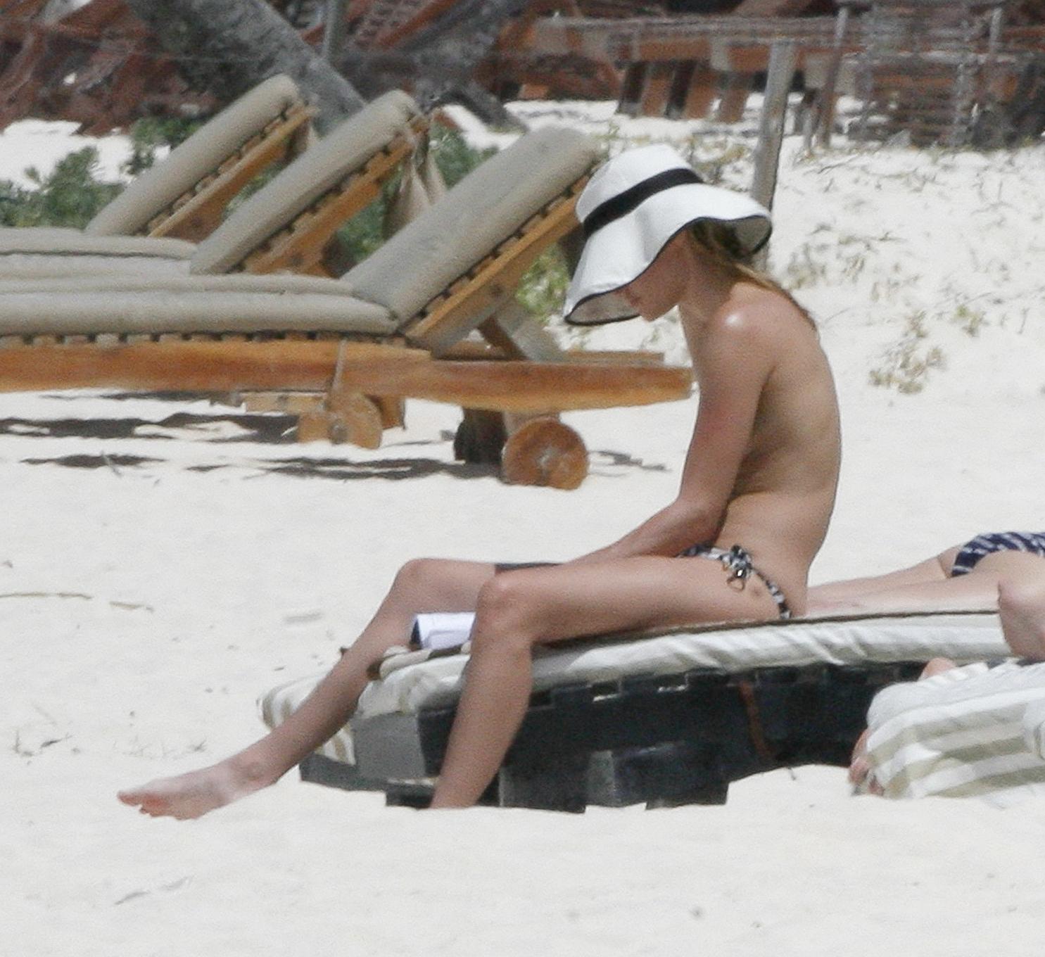 16P Kate Bosworth topless on the beach in Mexico but stupid paparazzi caught almost 