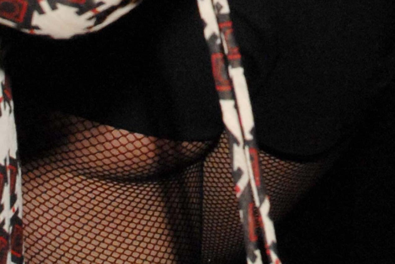 16P Paris Hilton caught showing her amazing ass