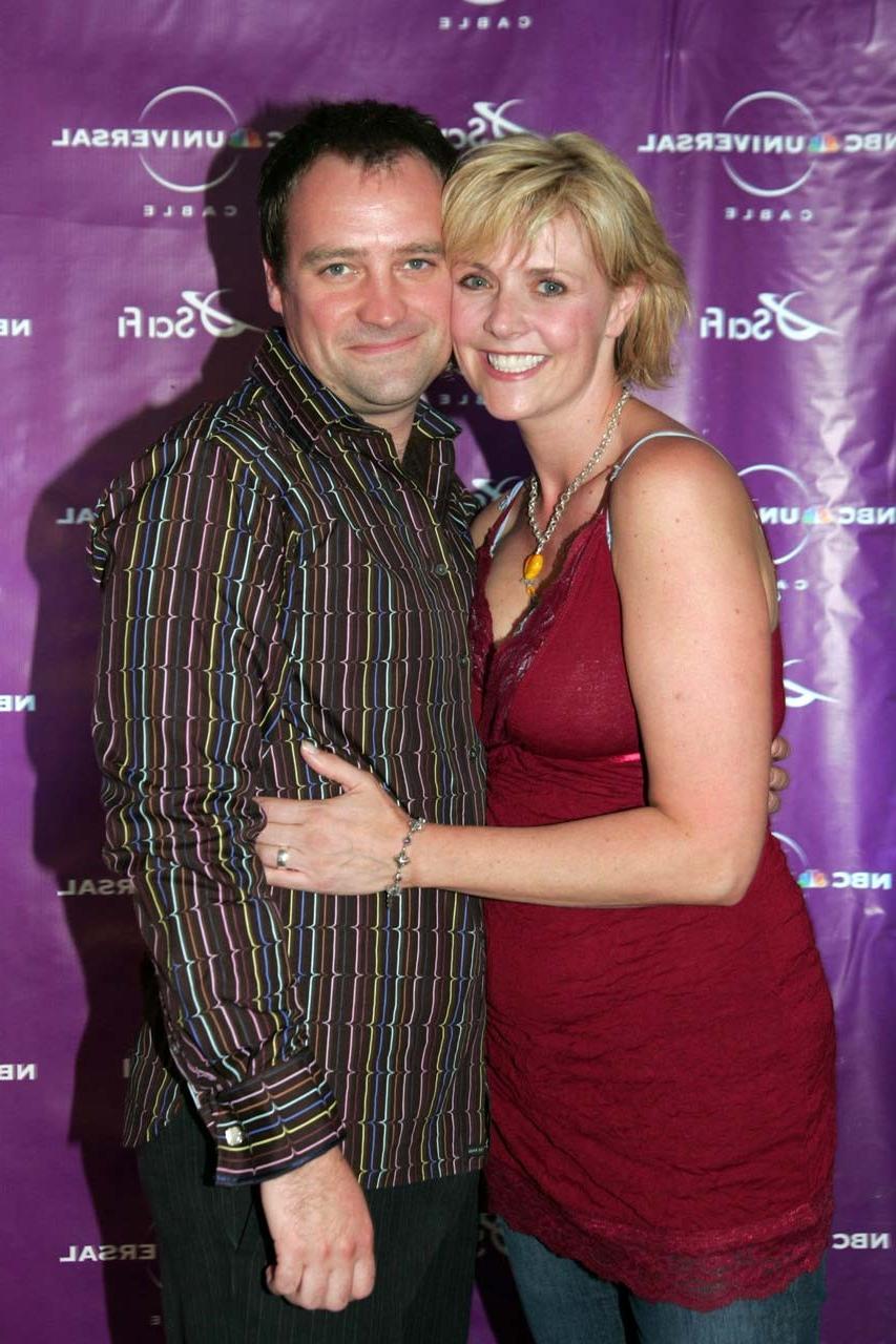 10P Amanda Tapping showing her great legs and posing topless with American flag