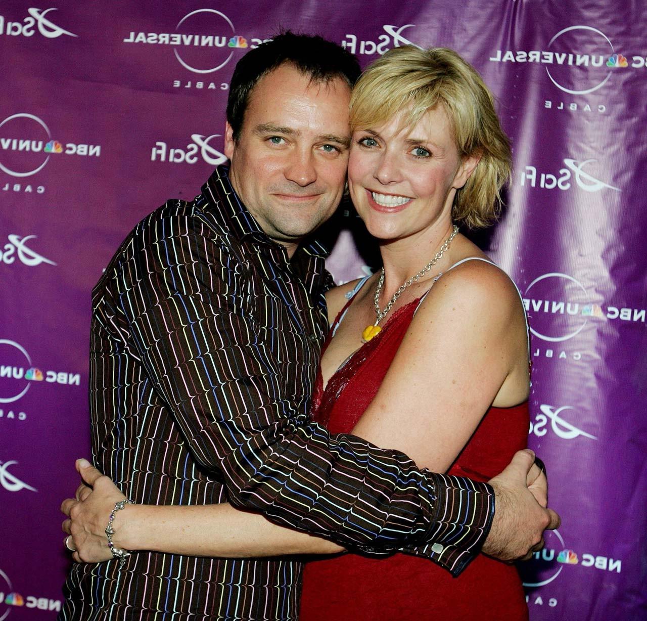 10P Amanda Tapping showing her great legs and posing topless with American flag