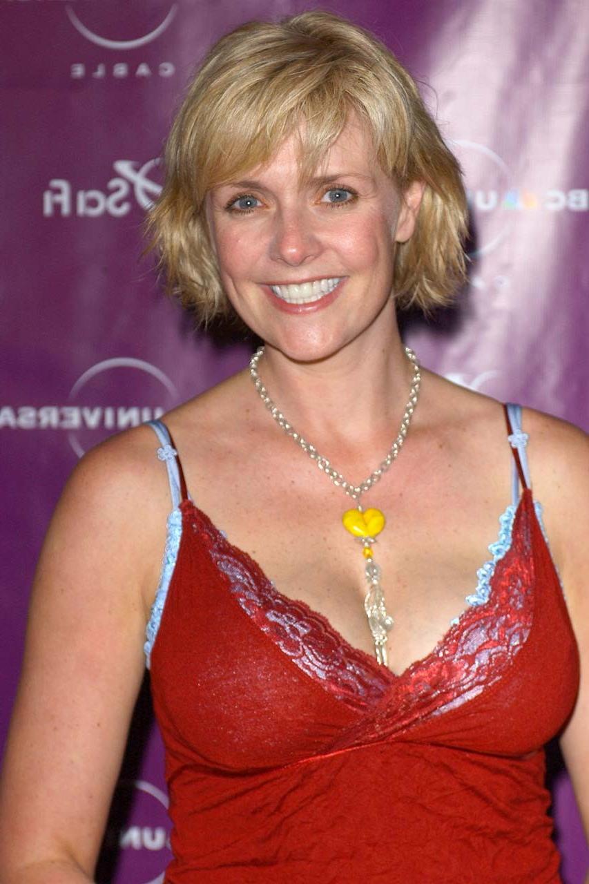 10P Amanda Tapping showing her great legs and posing topless with American flag
