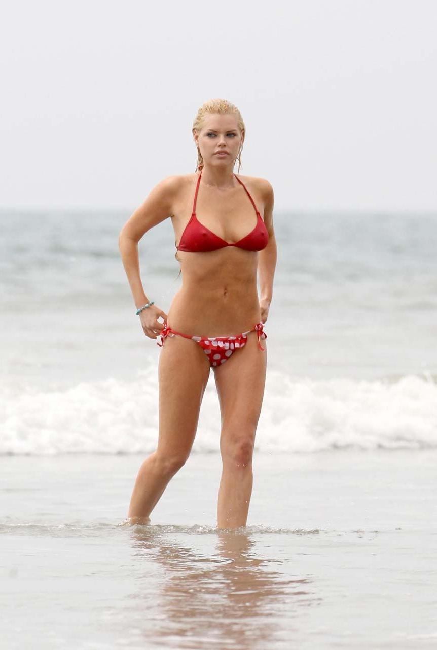 16P Sophie Monk flasning her huge tits and sexy ass in red bikini on beach