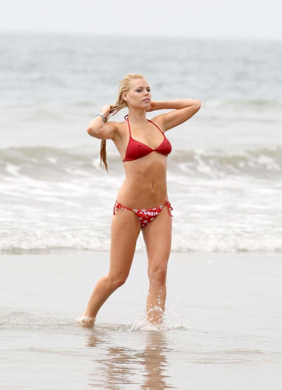 16P Sophie Monk flasning her huge tits and sexy ass in red bikini on beach