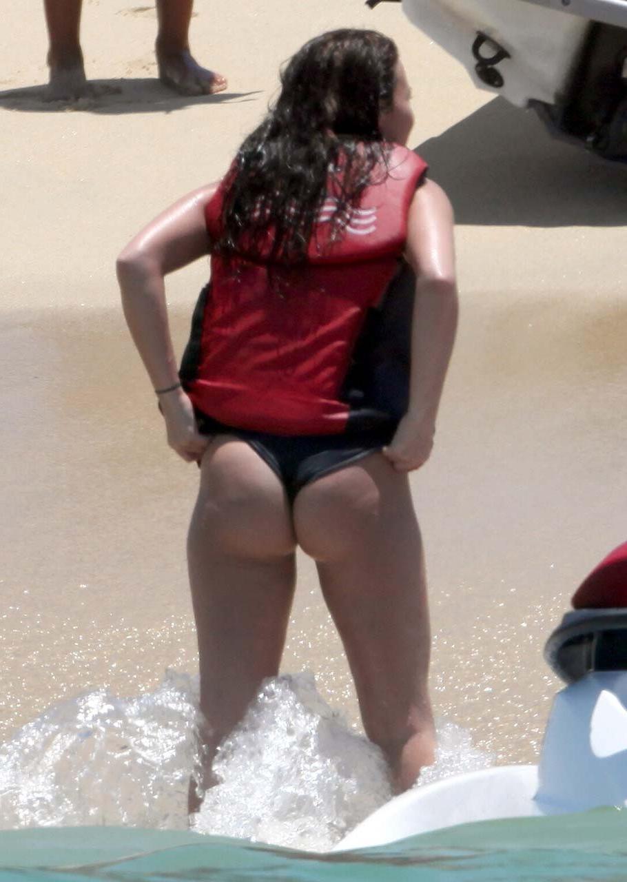 10P Demi Lovato showing ass crack in bikini on beach and gets her tits grabbed