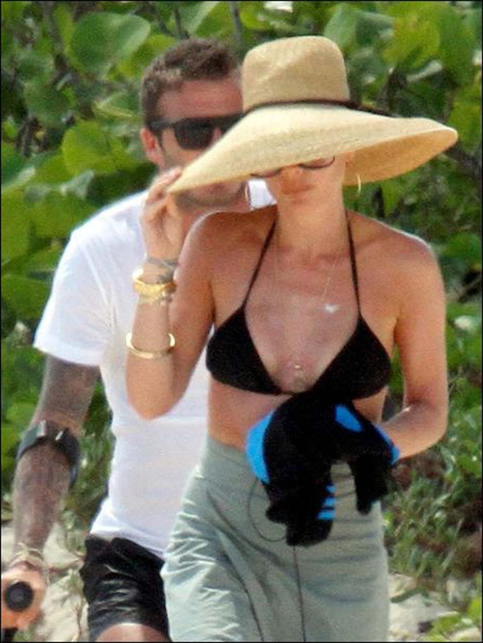 10P Victoria Beckham caught topless by paparazzi while sunbathing and sexy in bikini