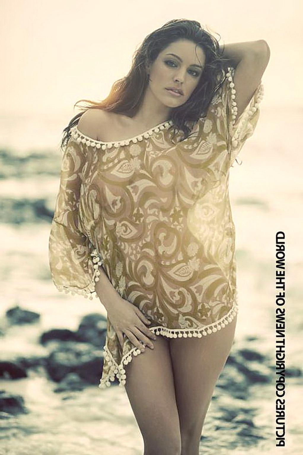 16P Kelly Brook nude showing off her big naturals in a beach photoshoot