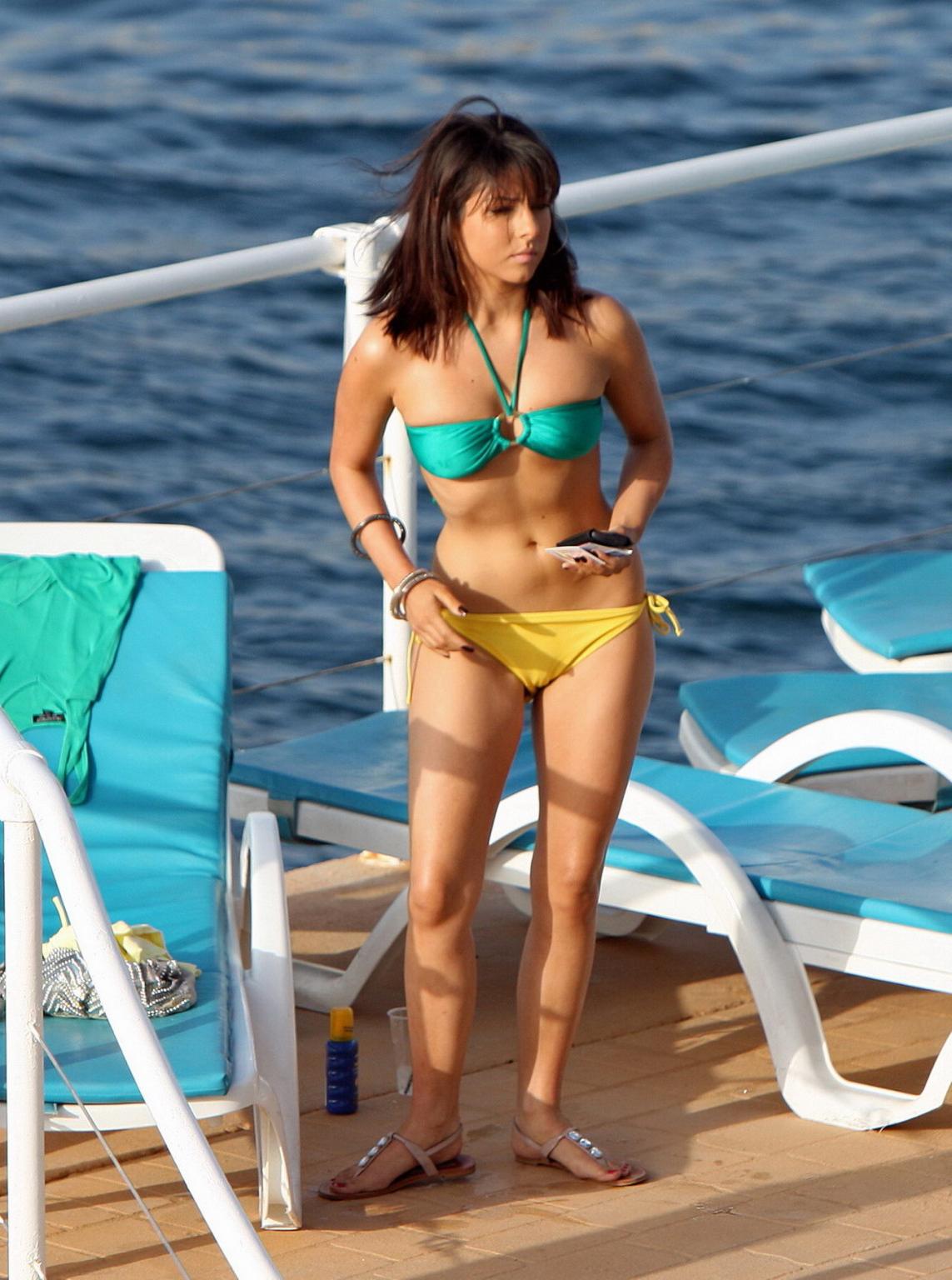 15P Roxanne Pallett wearing skimpy bikini poolside in Spain