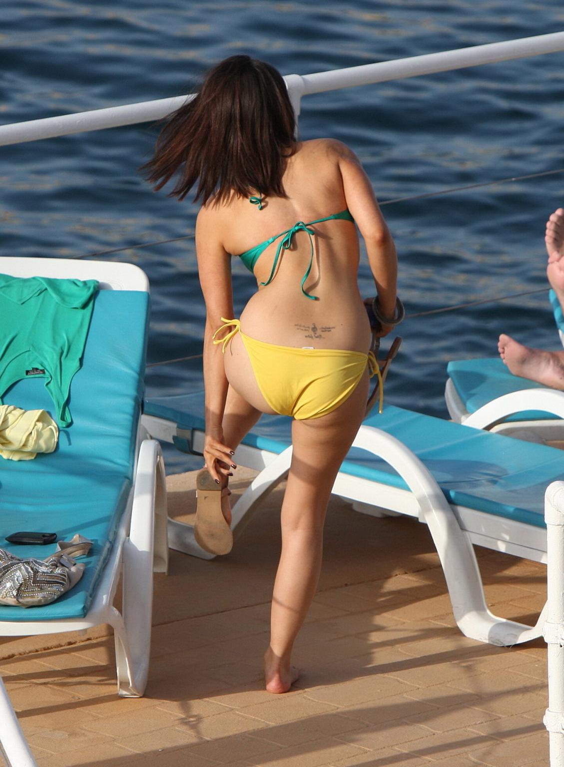 15P Roxanne Pallett wearing skimpy bikini poolside in Spain