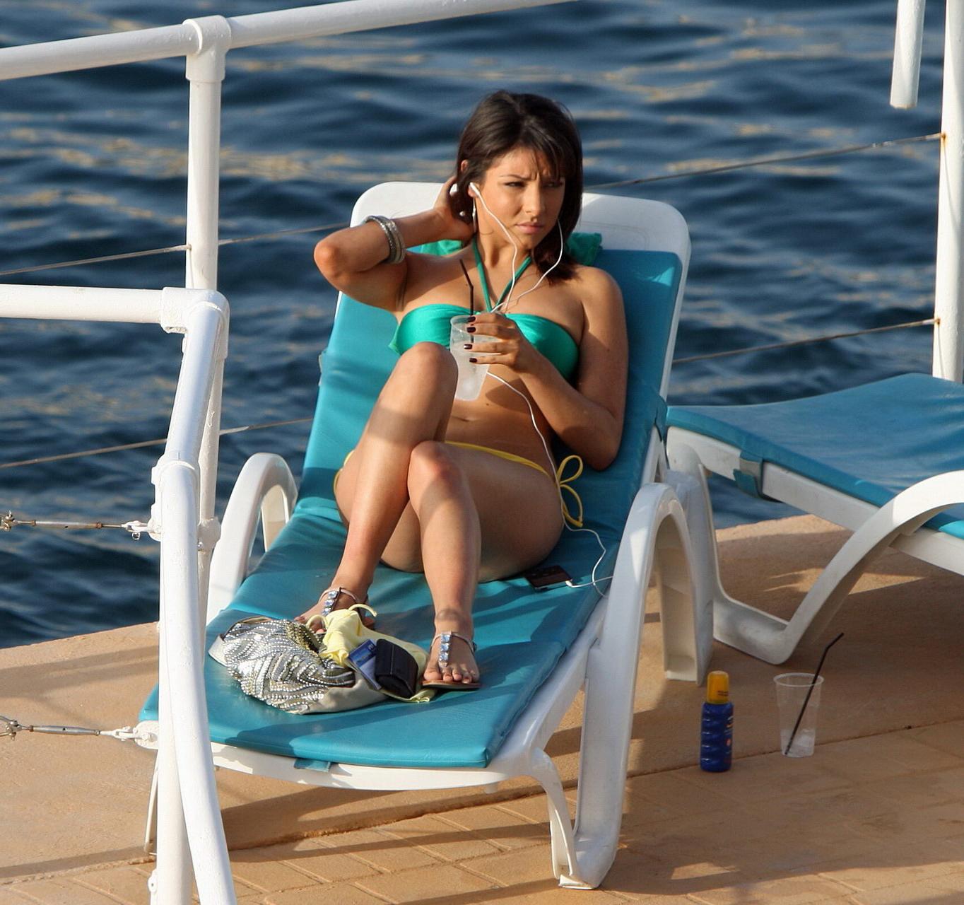 15P Roxanne Pallett wearing skimpy bikini poolside in Spain