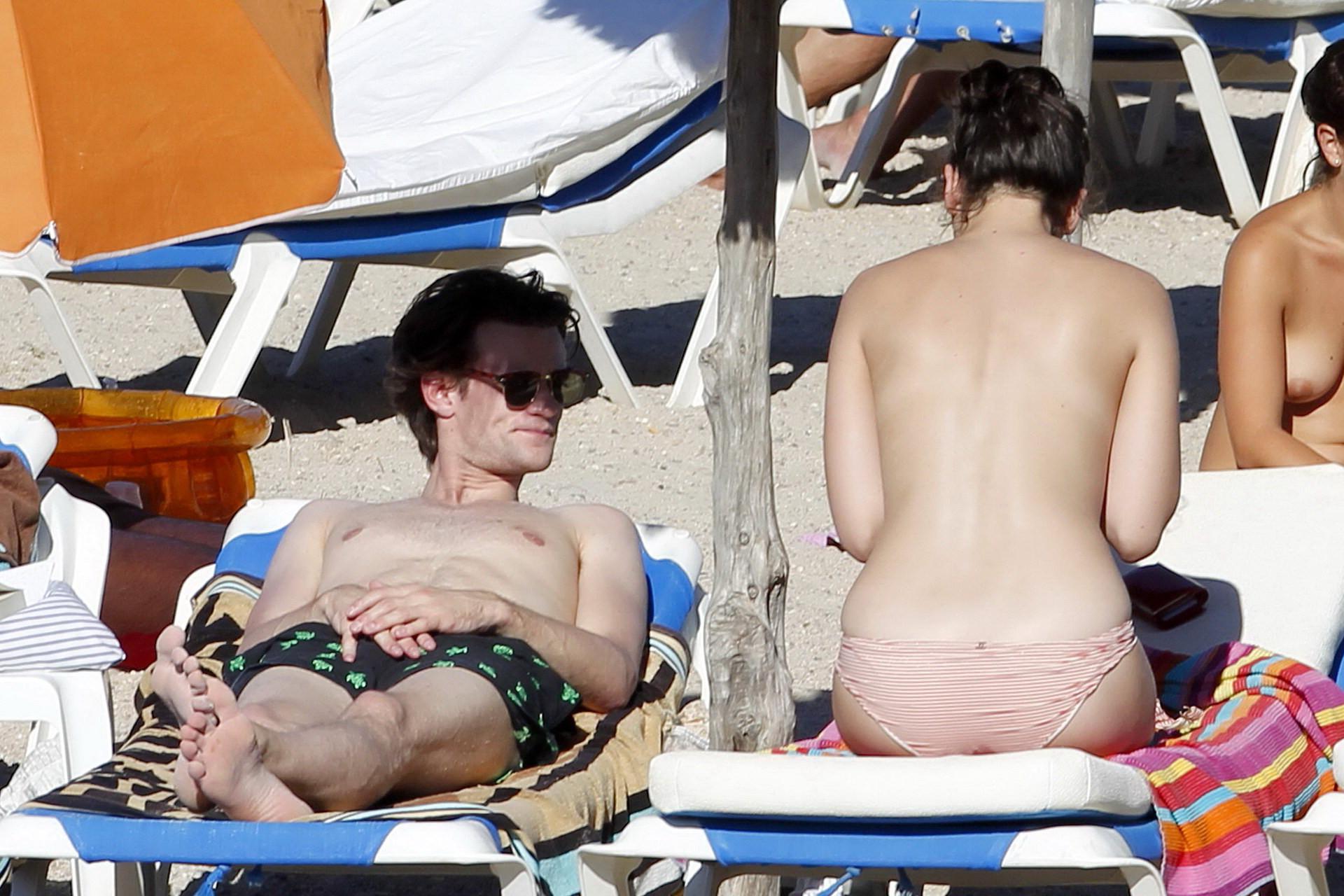 15P Daisy Lowe topless tanning her big boobs on the beach in Ibiza
