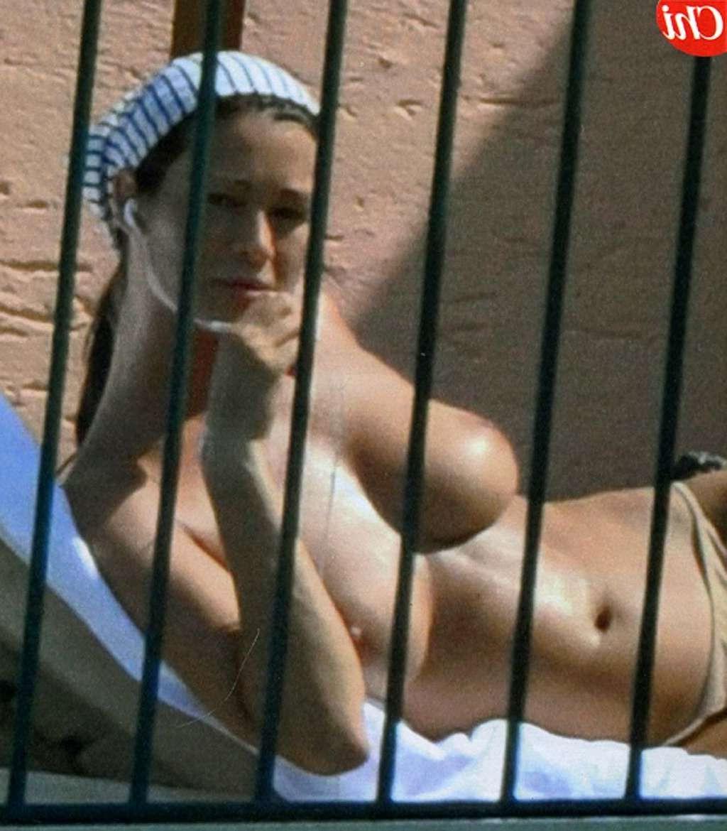 10P Manuela Arcuri caught by paparazzi showing ass in thong and topless sunbathing