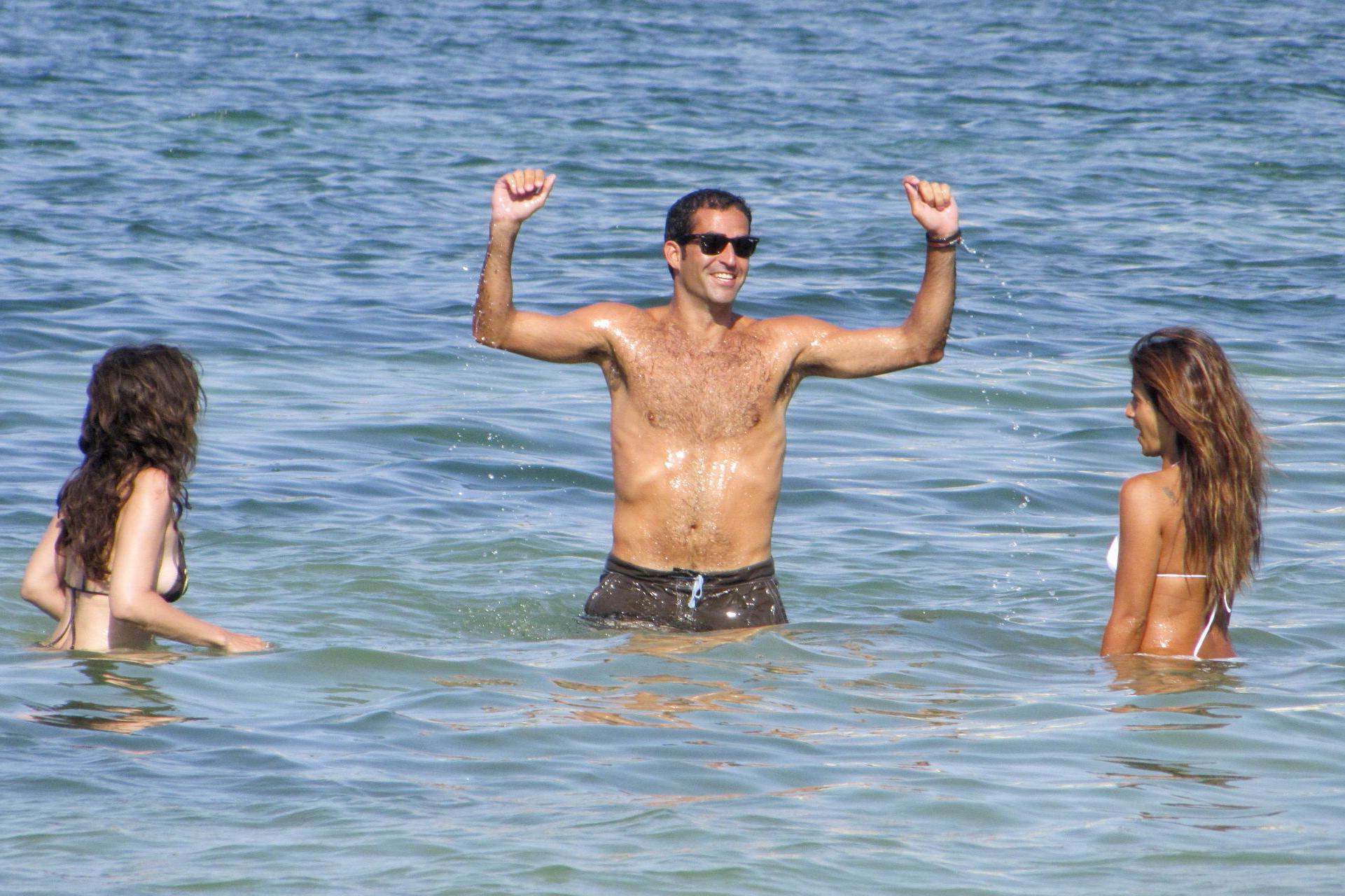 15P Monica Cruz wearing sexy bikini on the beach in Ibiza