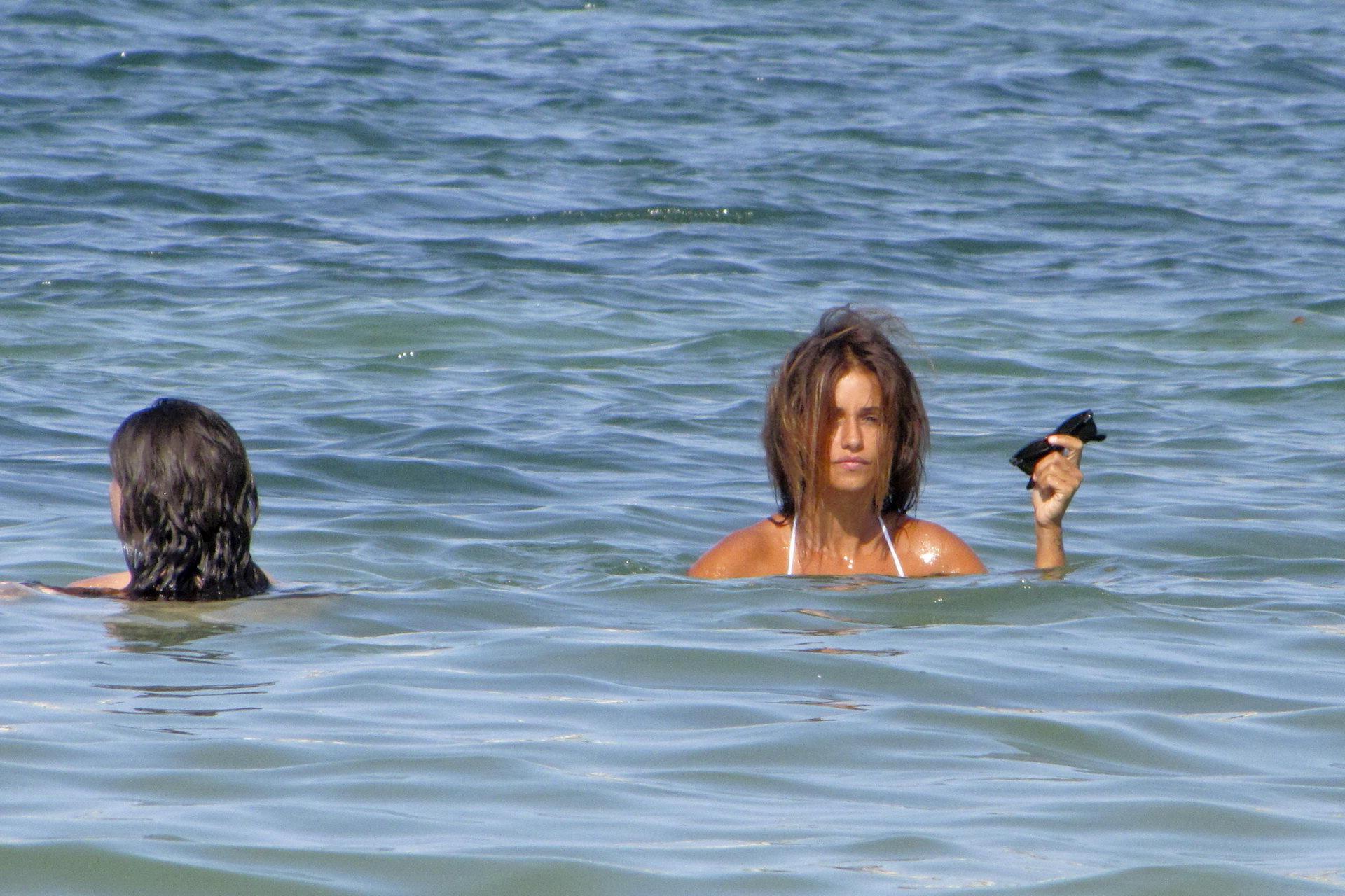 15P Monica Cruz wearing sexy bikini on the beach in Ibiza