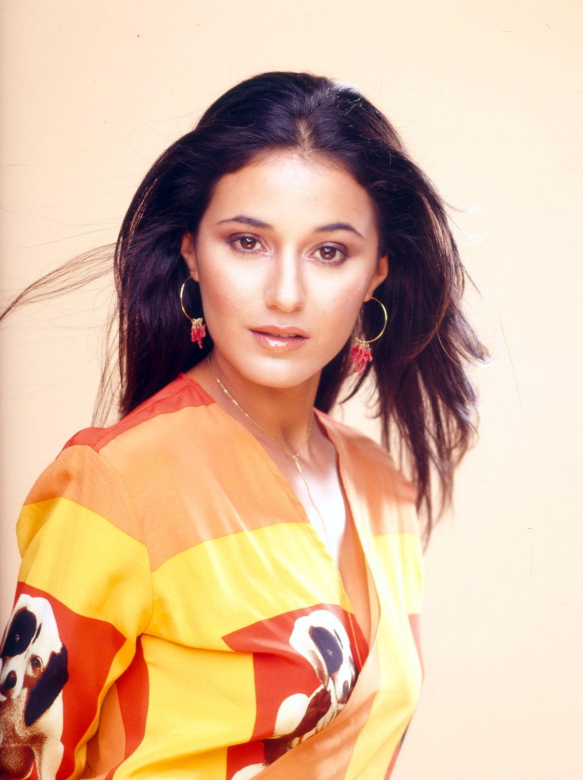 16P Emmanuelle Chriqui topless hiding her little boobs in this very hot photoshoot