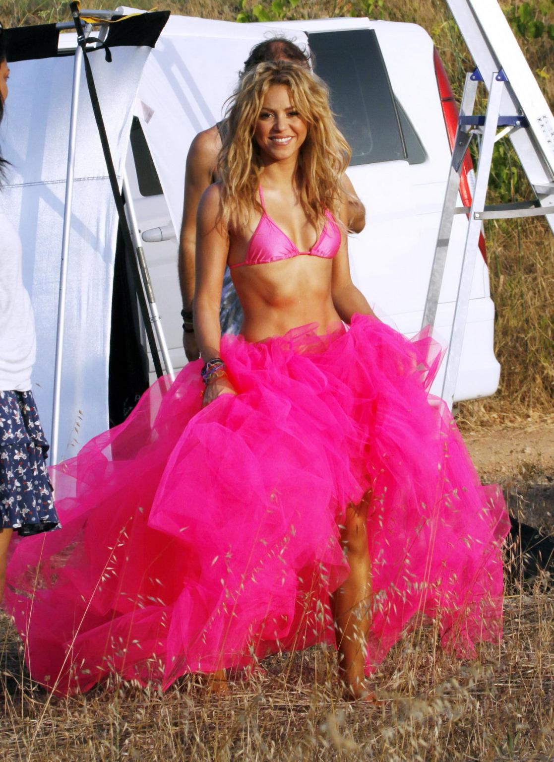 15P Shakira Ripoll wearing pink bikini top  skirt at the outdoor photoshoot
