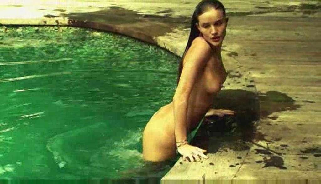 16P Rosie Huntington exposing her nice tits while filming for photoshoot