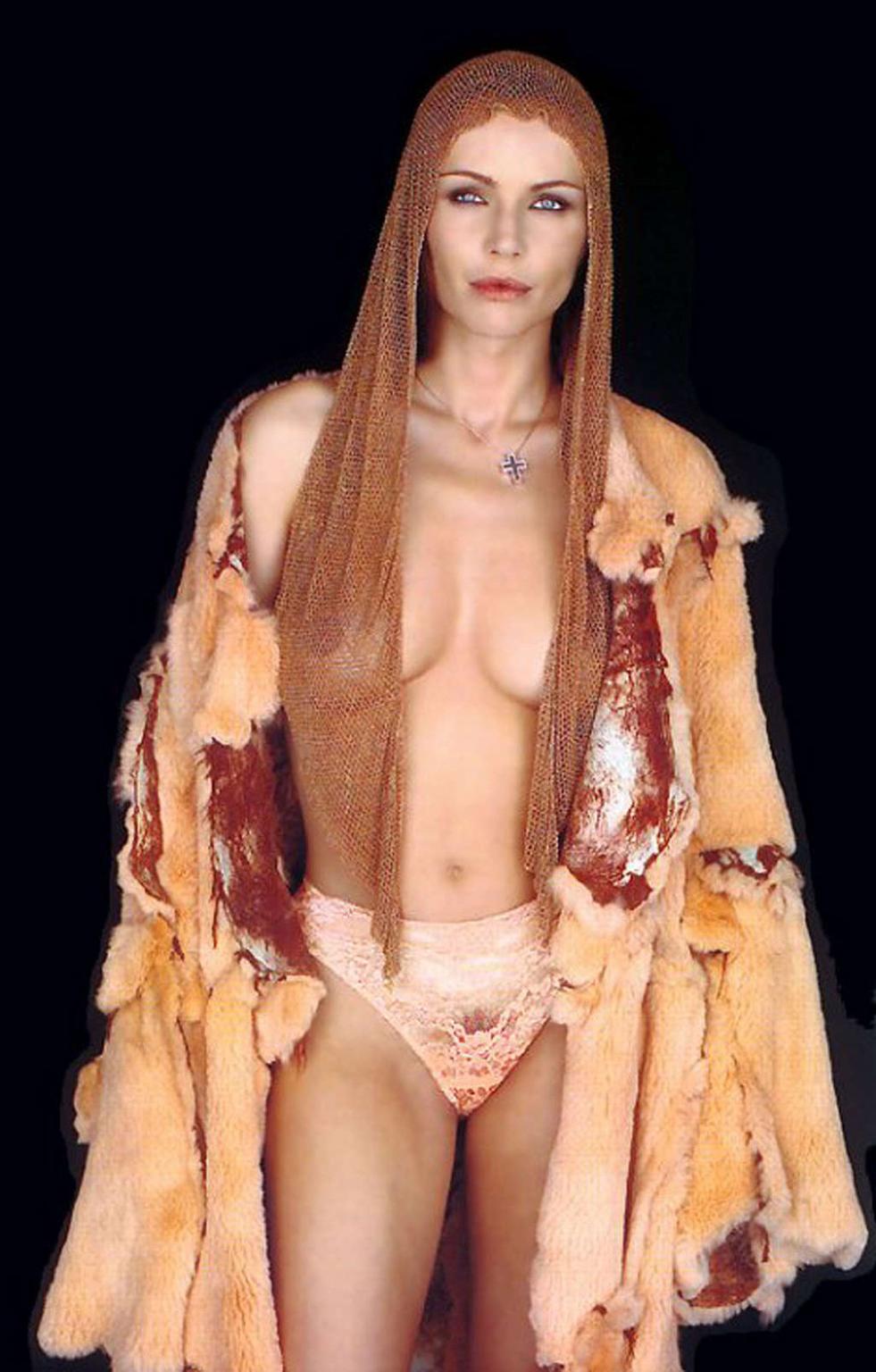10P Francesca Neri exposing her nice big boobs for some photoshoot