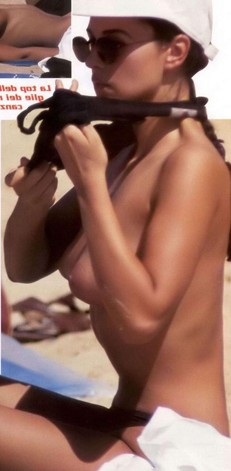 10P Monica Bellucci caught sunbathing topless on beach paparazzi shoots and nude in 