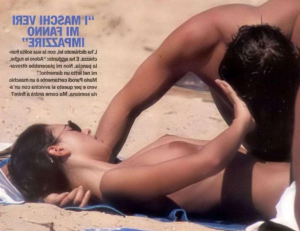 10P Monica Bellucci caught sunbathing topless on beach paparazzi shoots and nude in 