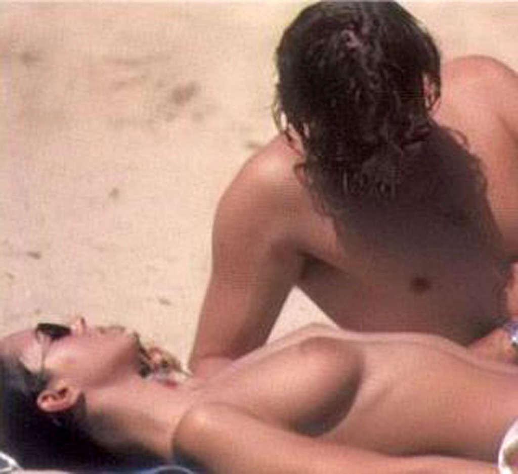 10P Monica Bellucci caught sunbathing topless on beach paparazzi shoots and nude in 