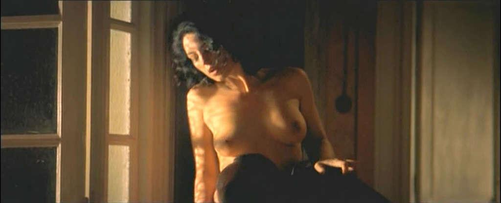 10P Monica Bellucci caught sunbathing topless on beach paparazzi shoots and nude in 