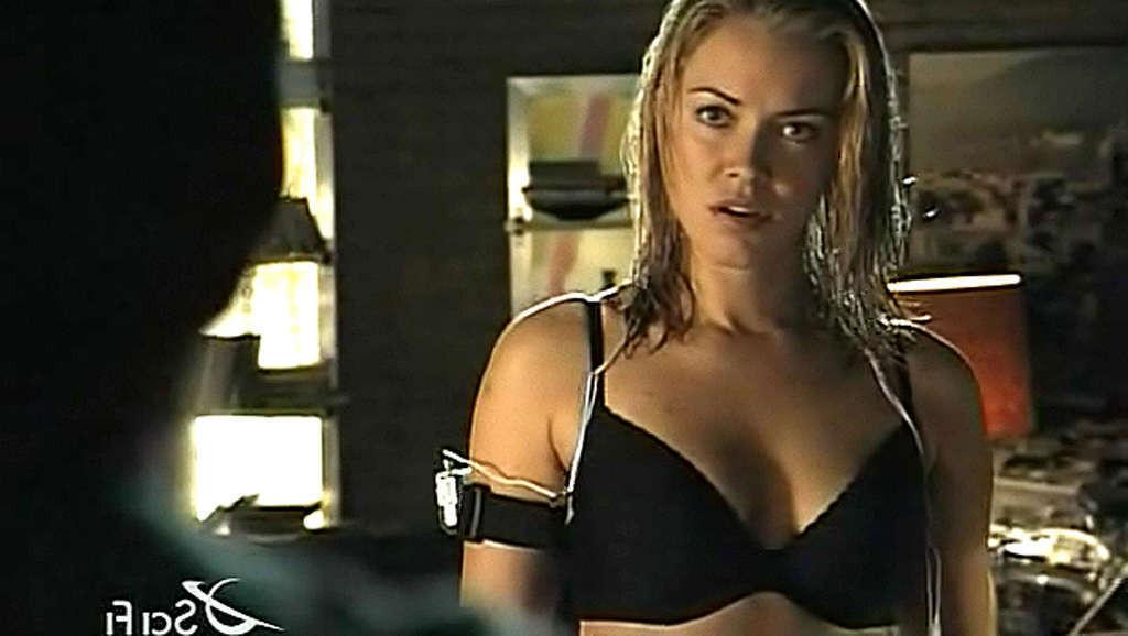 10P Kristanna Loken exposing her nice tits in movie and caught in lesbian kiss papar