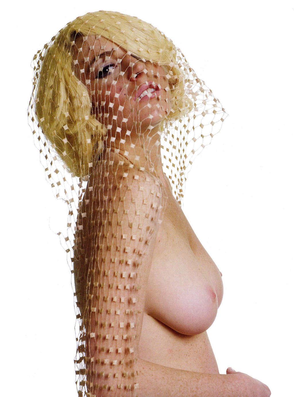 16P Lindsay Lohan posing topless for some photoshoot and upskirt