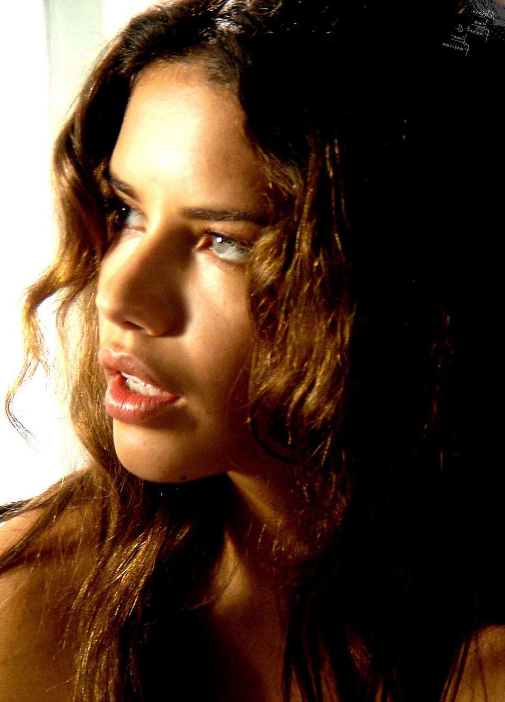 16P Adriana Lima posing nude and sexy on bed in photoshoot