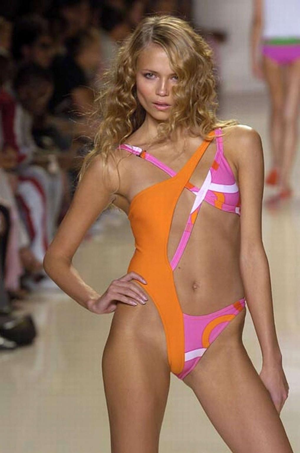 10P Natasha Poly showing her nice tiny tits in photoshoot