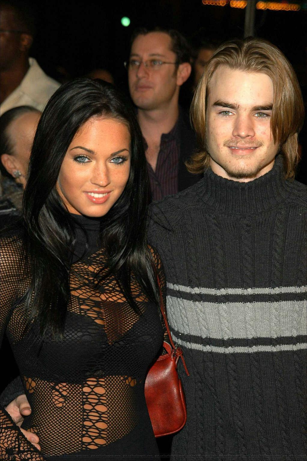 15P Megan Fox looking sexy in photoshoot and showing her tits