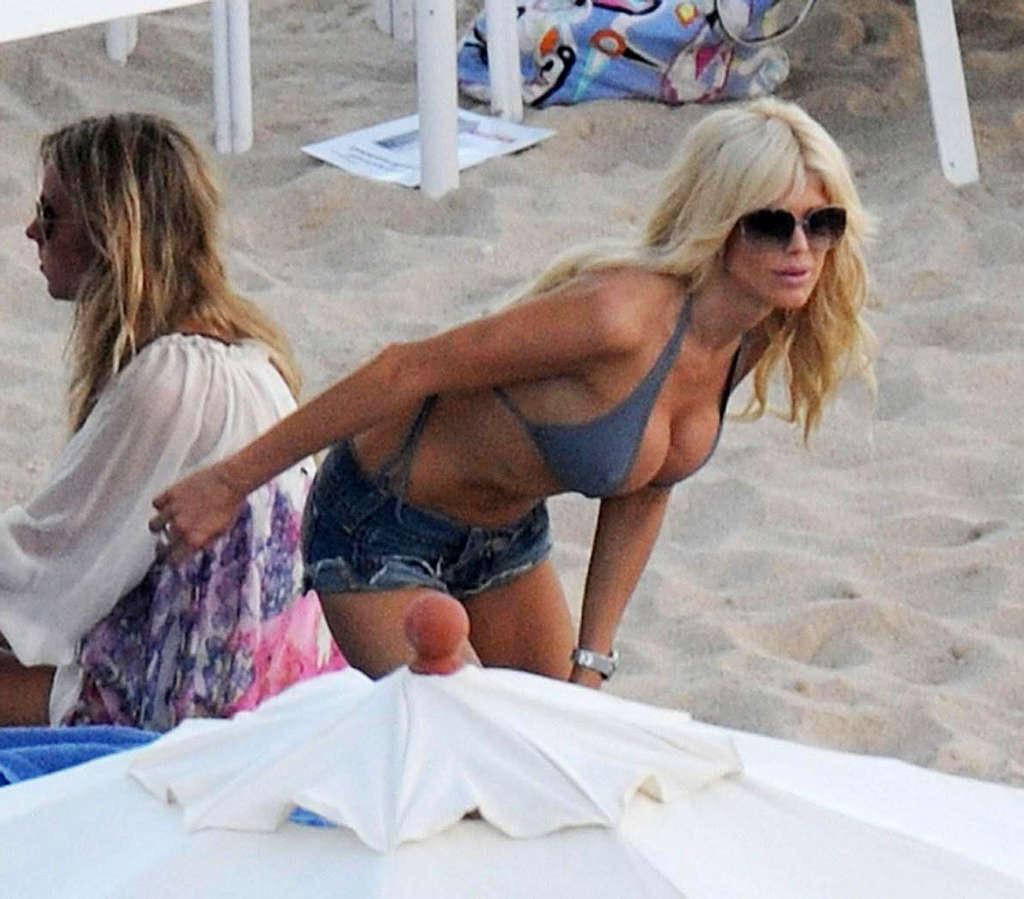 10P Victoria Silvstedt huge tits exposed and upskirt outside paparazzi pictures