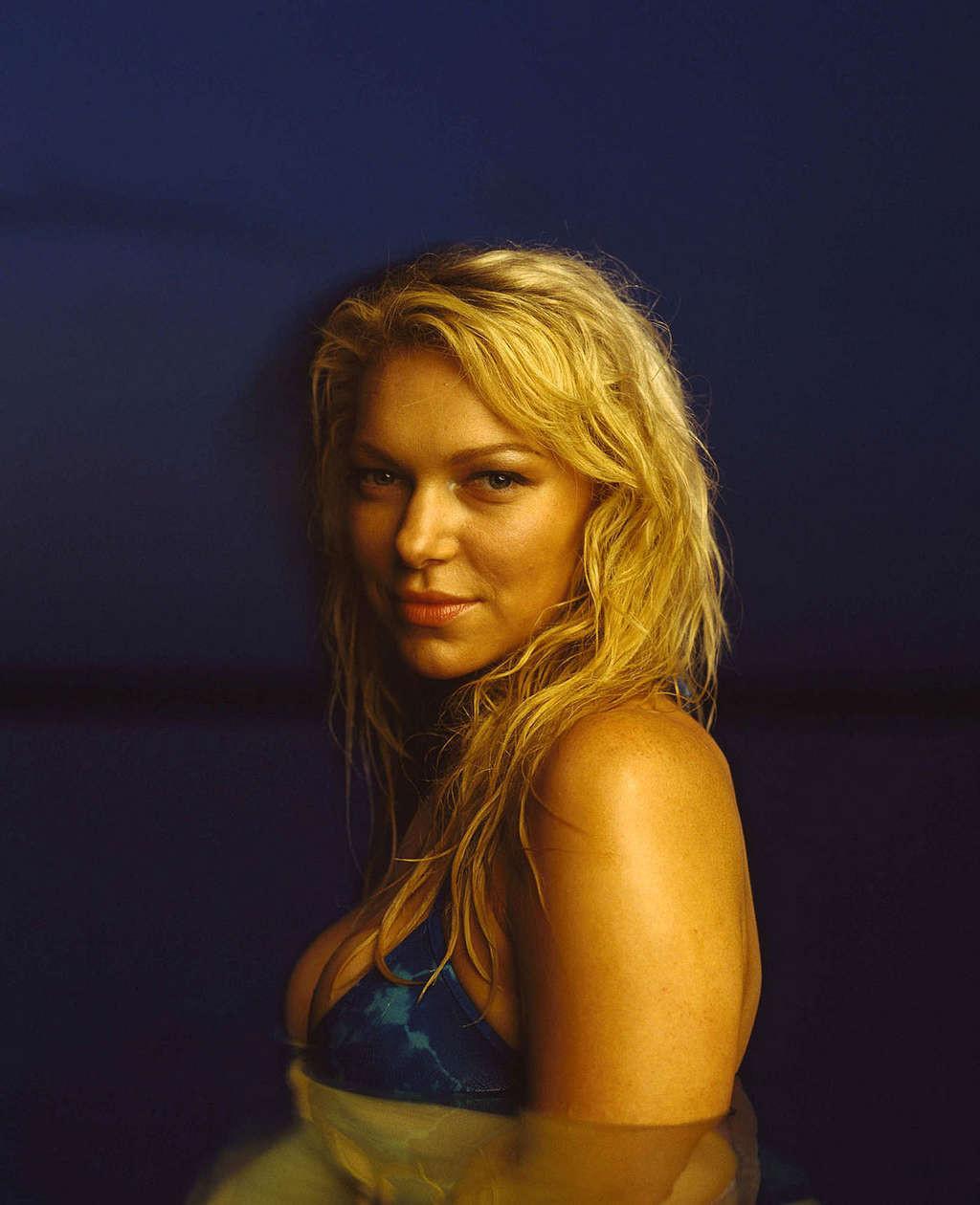 10P Laura Prepon looking hot in bikini and exposing a bit of ass in photoshoot