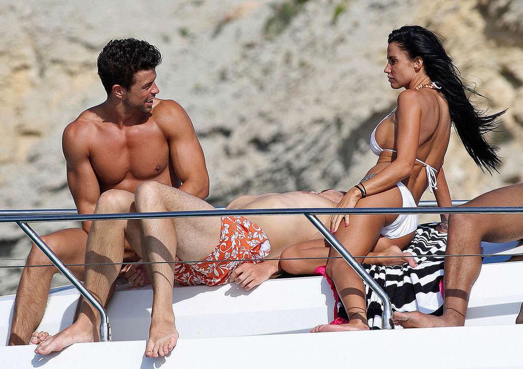 16P Katie Price posing and showing her huge tits in bikini