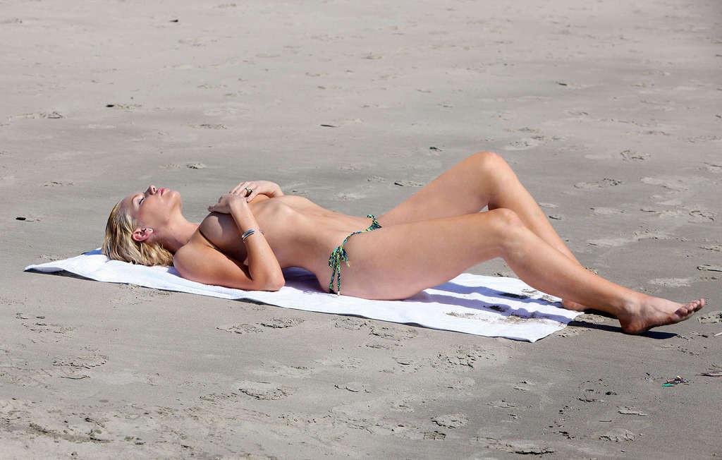 16P Sophie Monk showing her nice and sexy body and huge tits