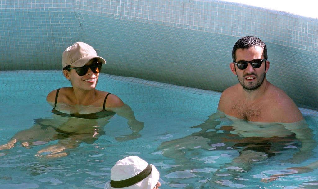 15P Rosario Dawson enjoying at the pool and showing her huge tits very sexy photos
