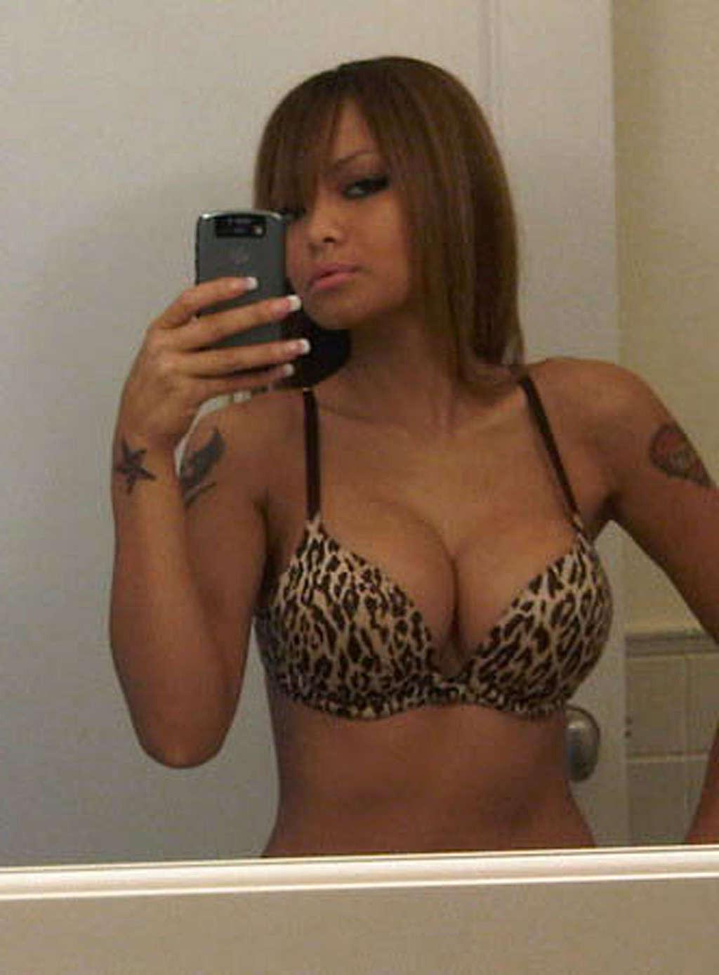 16P Tila Nguyen posing in front of the mirror and shows huge tits