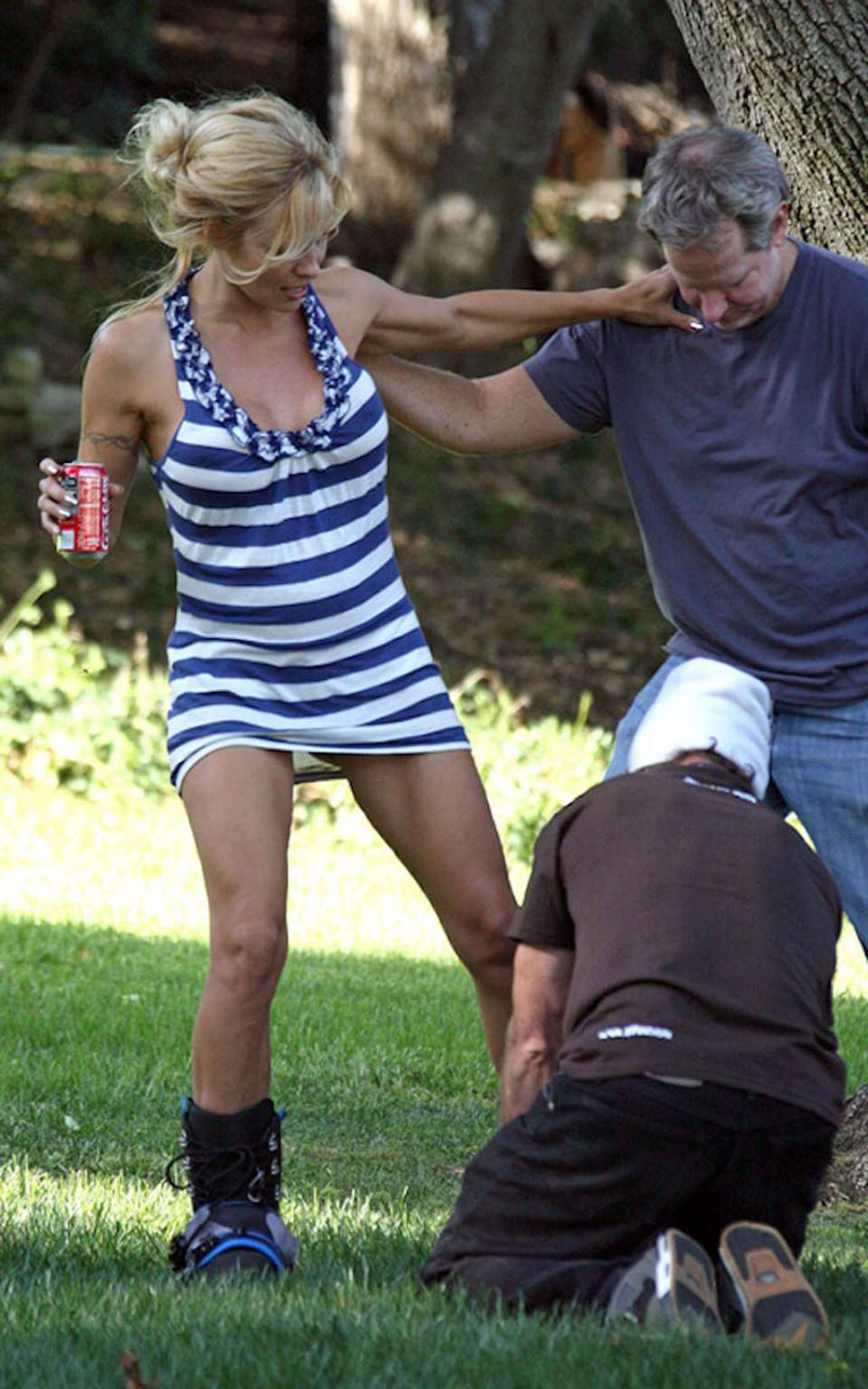 16P Pamela Anderson upskirt while snowbording on grass and squzzing boobs