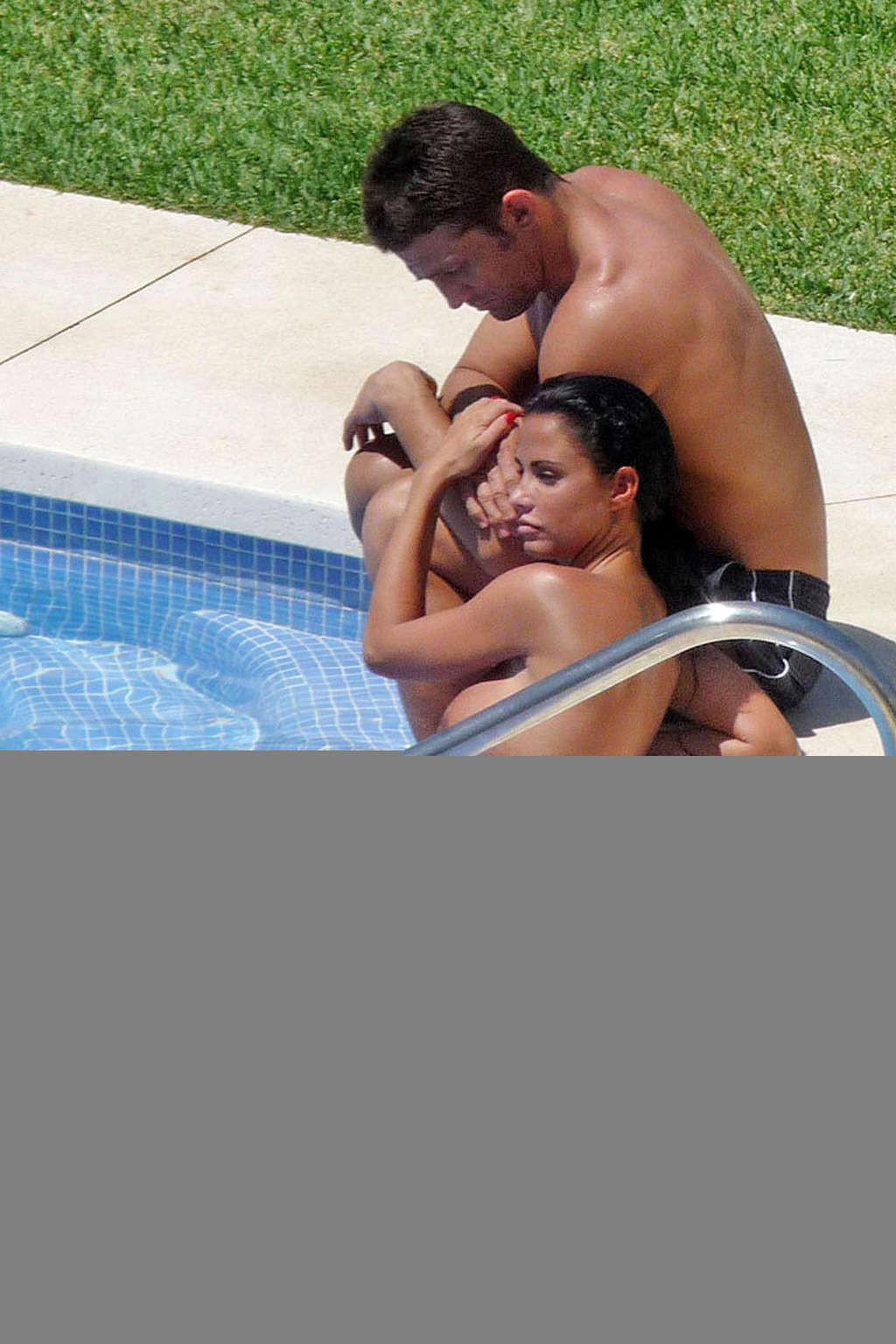 16P Katie Price shows huge tits and fantastic ass in the pool