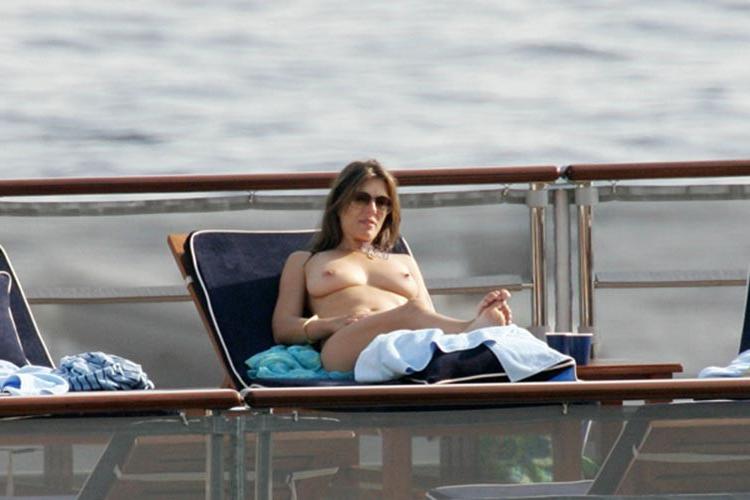 15P Elizabeth Hurley caught sunbathing topless