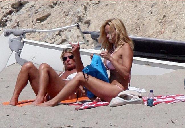 16P Pamela Anderson naked boobs in fetish photos