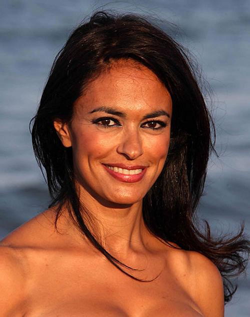 10P Maria Grazia Cucinotta looking very sexy and busty on some photoshoot
